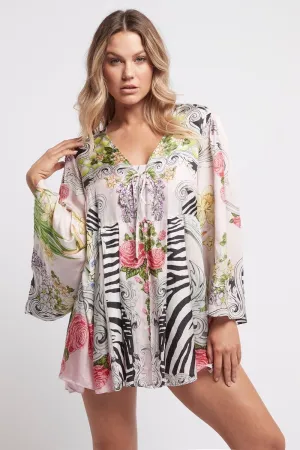 A LADY IN PINK SHORT ROBE