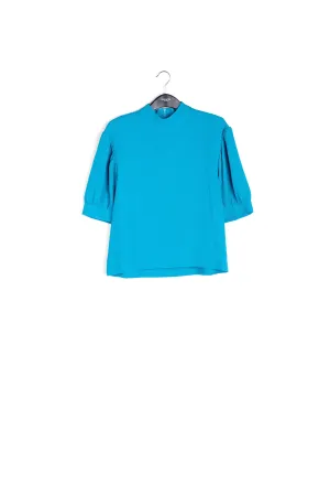 Blue top with puffed sleeves