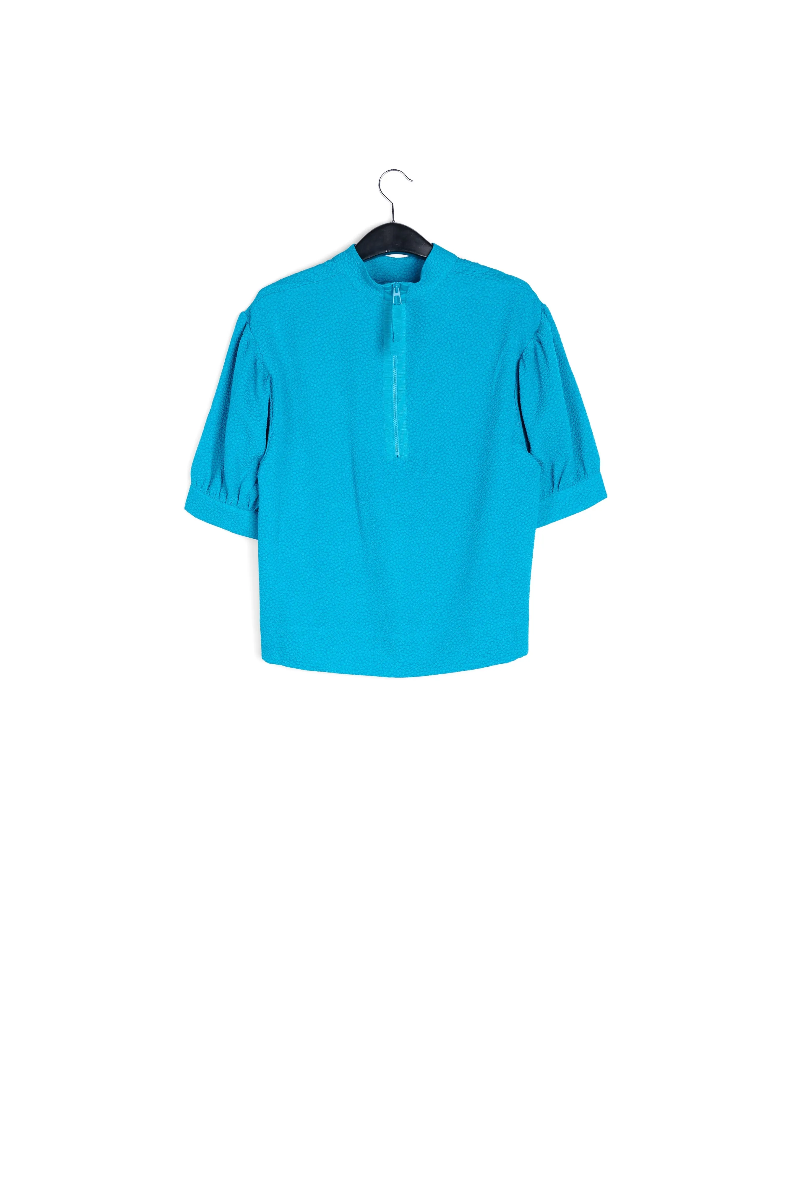 Blue top with puffed sleeves