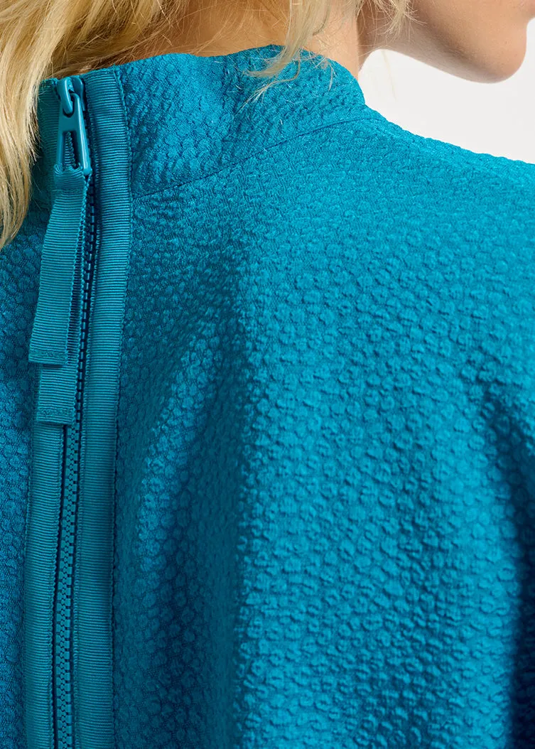 Blue top with puffed sleeves
