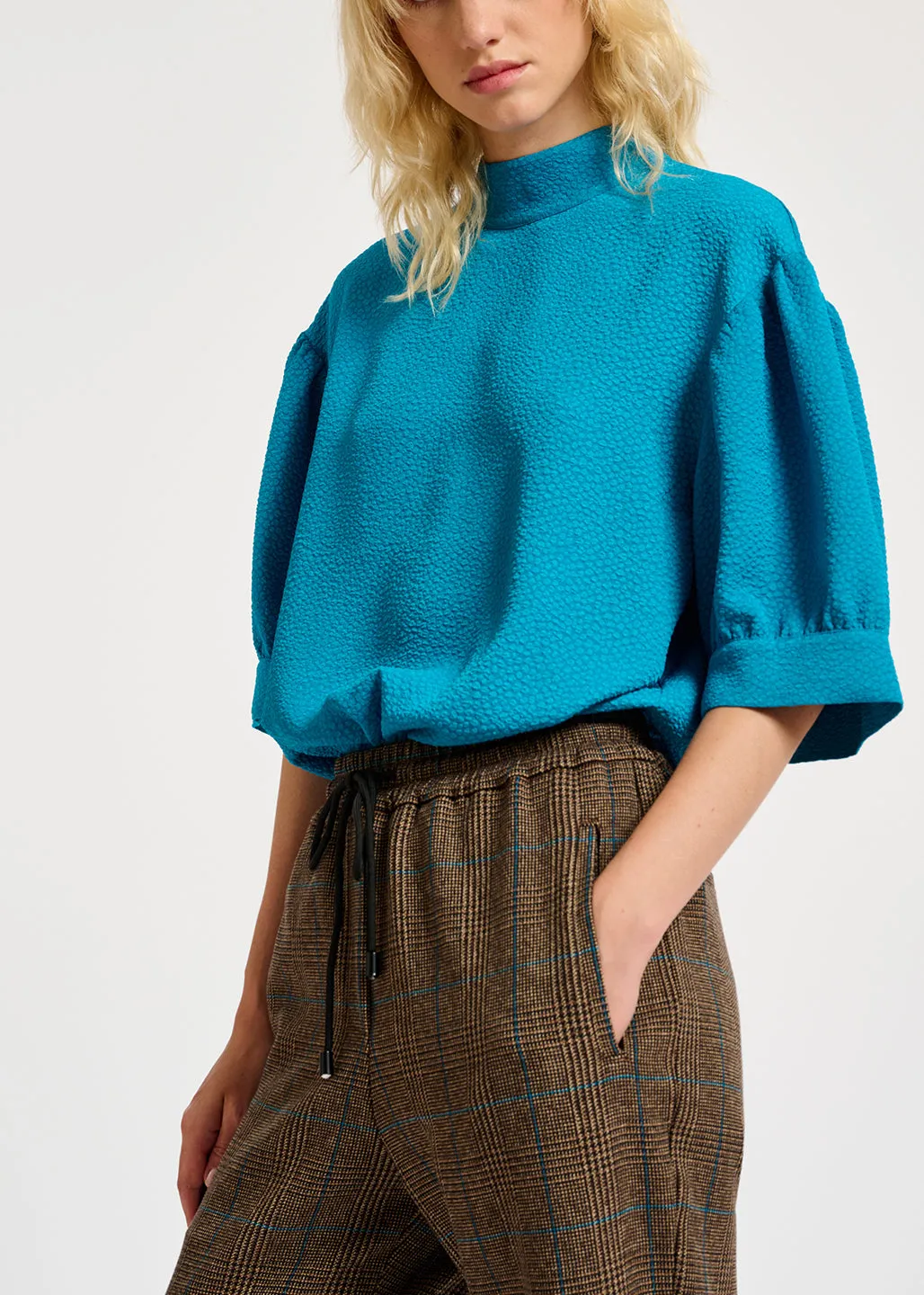 Blue top with puffed sleeves