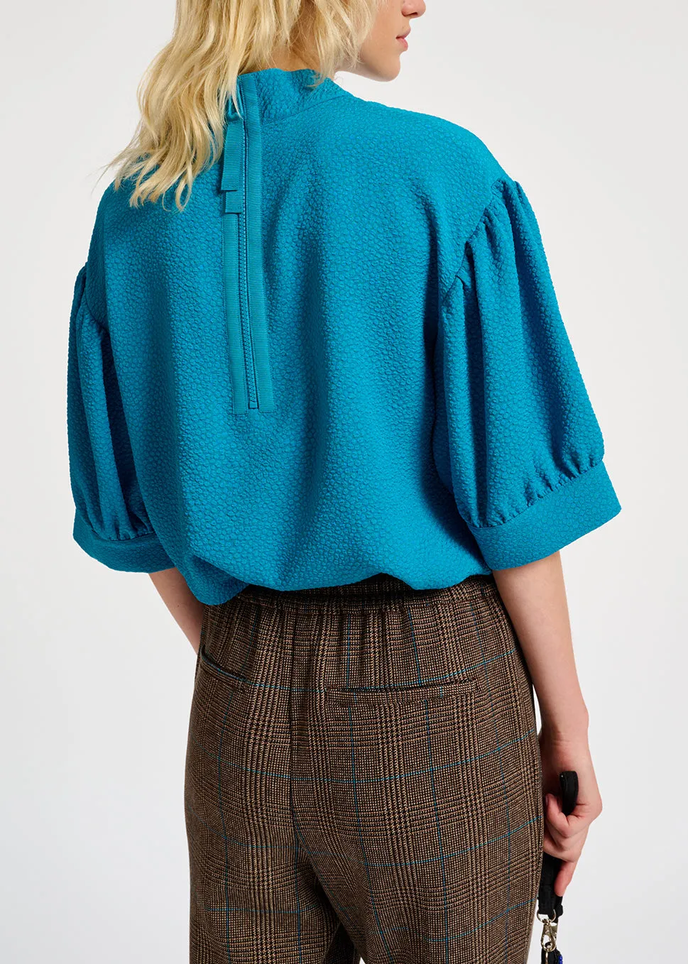 Blue top with puffed sleeves