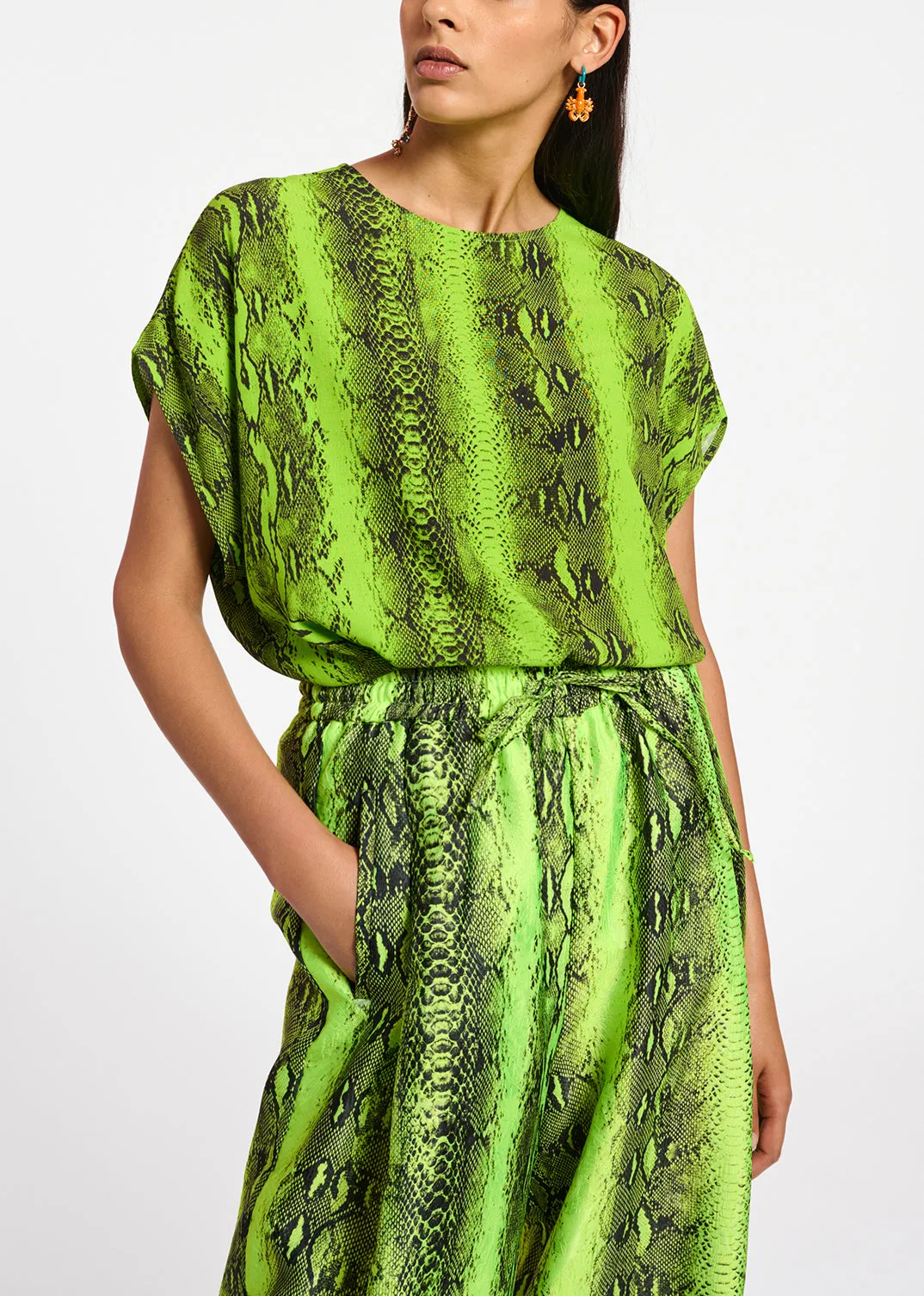 Lime green and black snake-print short-sleeved top