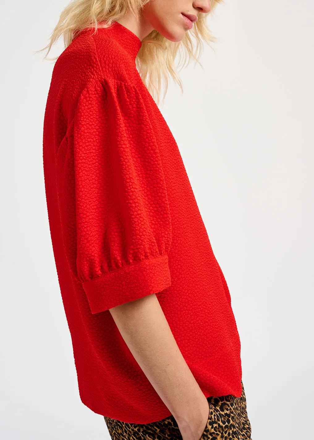 Red top with puffed sleeves