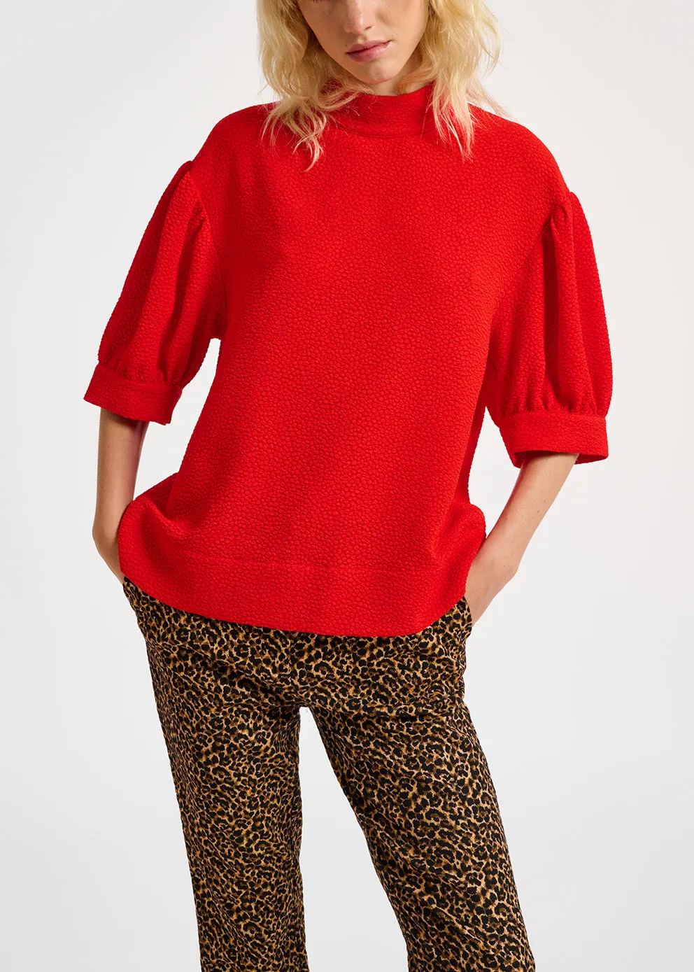 Red top with puffed sleeves