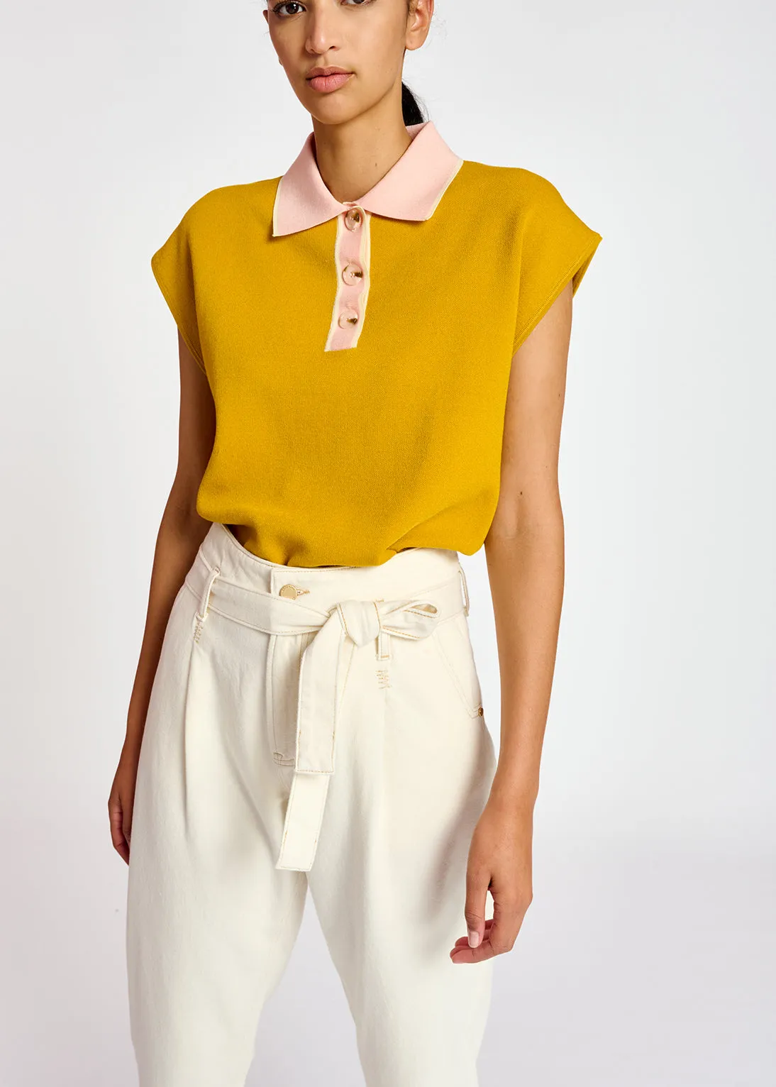 Yellow sleeveless polo top with contrasting collar